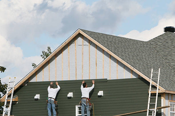 Professional Siding Contractor technician working in Home, PA